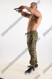 Duncan Action Pose With Guns